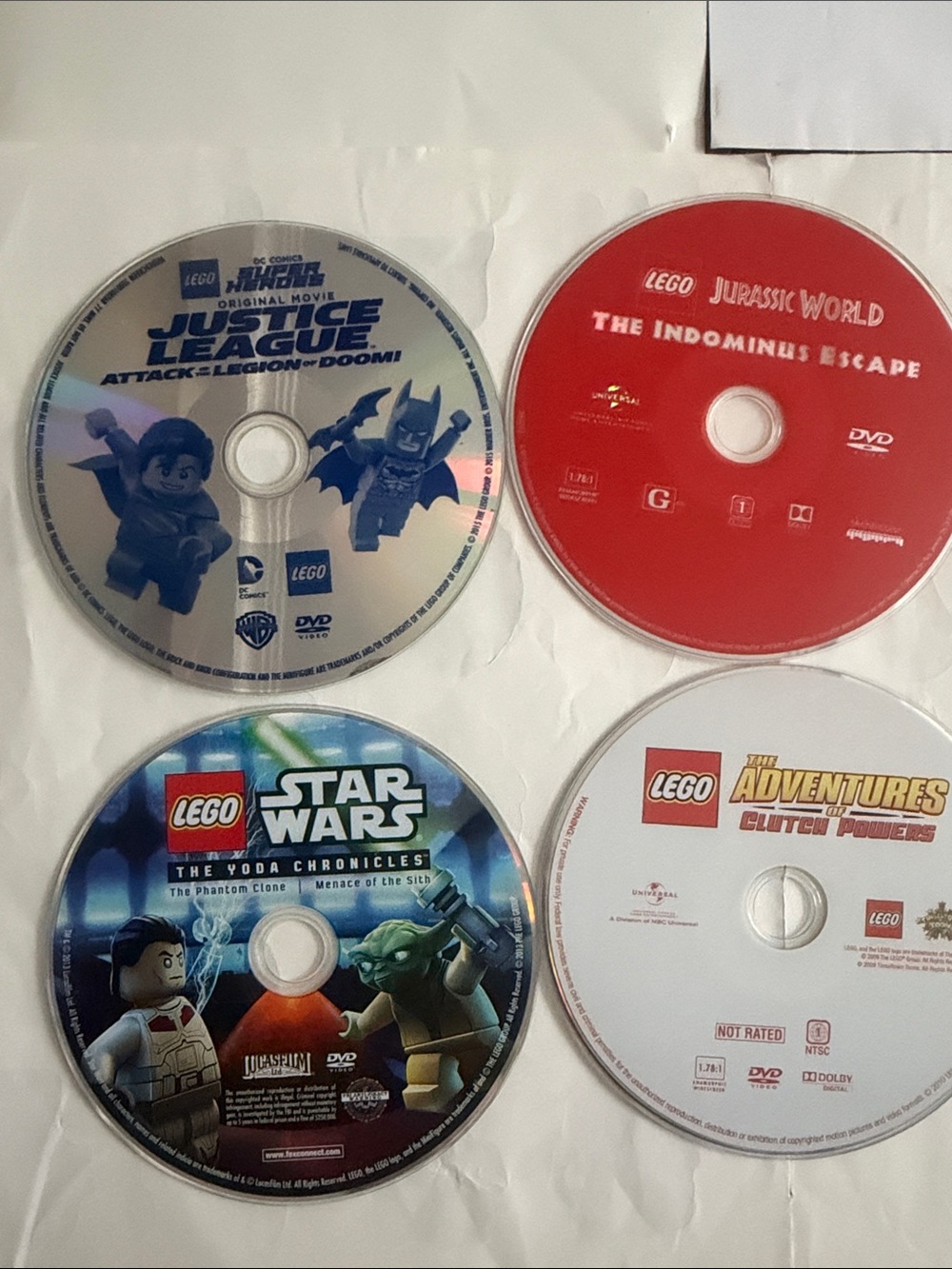 Lego DVD Set - Star Wats, Justice League. Jurassic Park, the Adventures